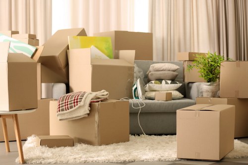 Packed boxes and moving equipment inside a removal van