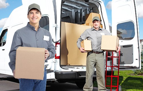 Liverpool residential moving team handling boxes and furniture