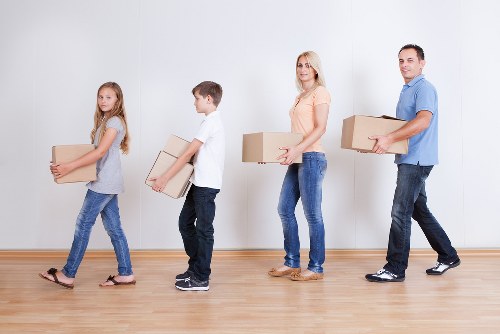 Business furniture and IT equipment being organised for a commercial move