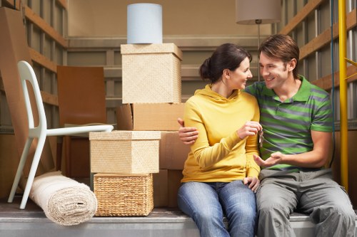 Professional movers loading furniture for a Liverpool relocation