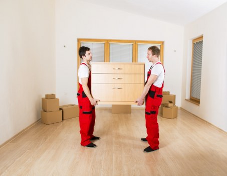 Furniture loading into a moving van in Liverpool street